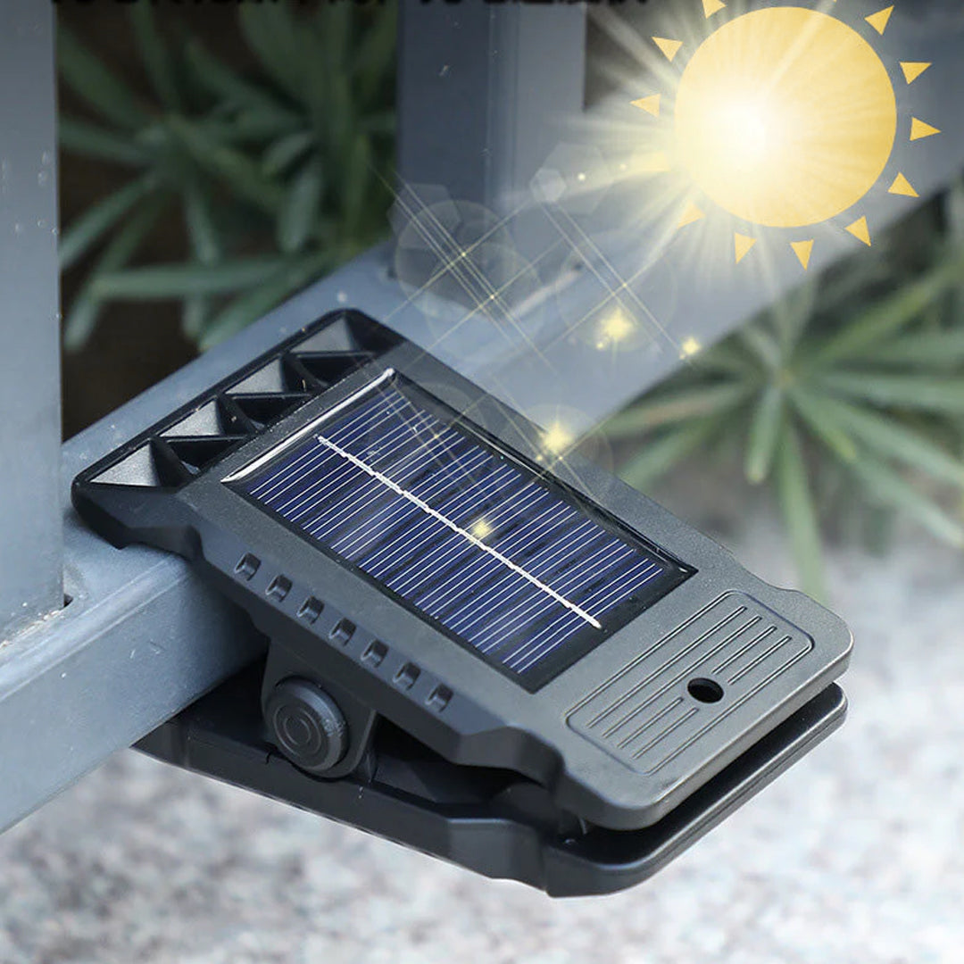 GlowClip LED glow light automatically lighting an outdoor pathway at night